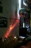 Reflections from an illuminated oil drop projector -- looks like fire when it's moving, sort of.