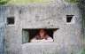 Me in a bunker on the beach.