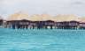Fancy schmancy huts that people in one of the hotels get to stay in. Yes, the water was that colour.