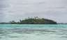 Possibly an island, possibly just an outcropping on the other side of the lagoon.