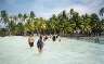 Everyone wandering up to the lagoonarium frmo the outrigger we'd ridden out there.