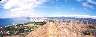Panoramic view from the top, the ocean on one side and the crater on the other, and Waikiki in the background.
